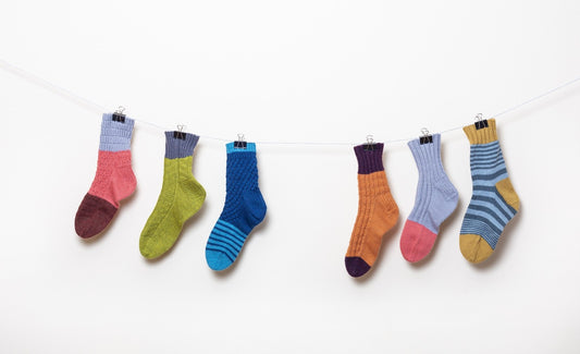 CoopKnits Socks Yeah! DK - Volume 1 Patterns is available to purchase from The Knit Lounge UK knit shop