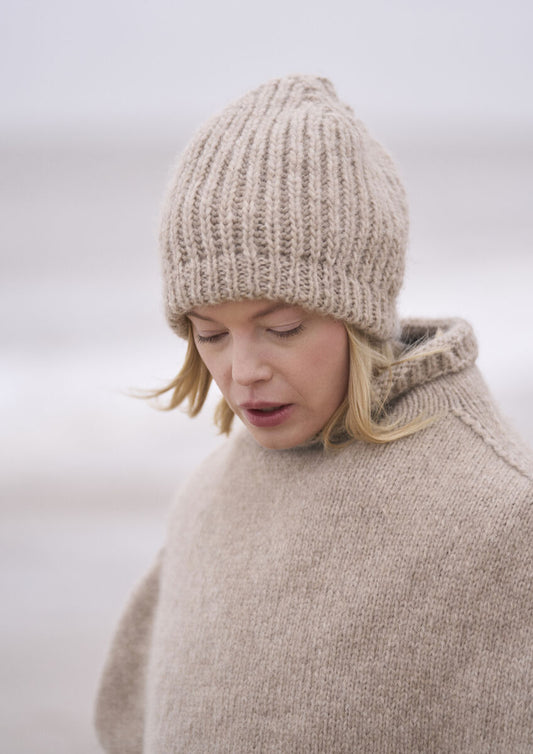 Mode at Rowan Sandbank Hat and Shore Poncho Pattern is available to purchase from The Knit Lounge UK knit shop