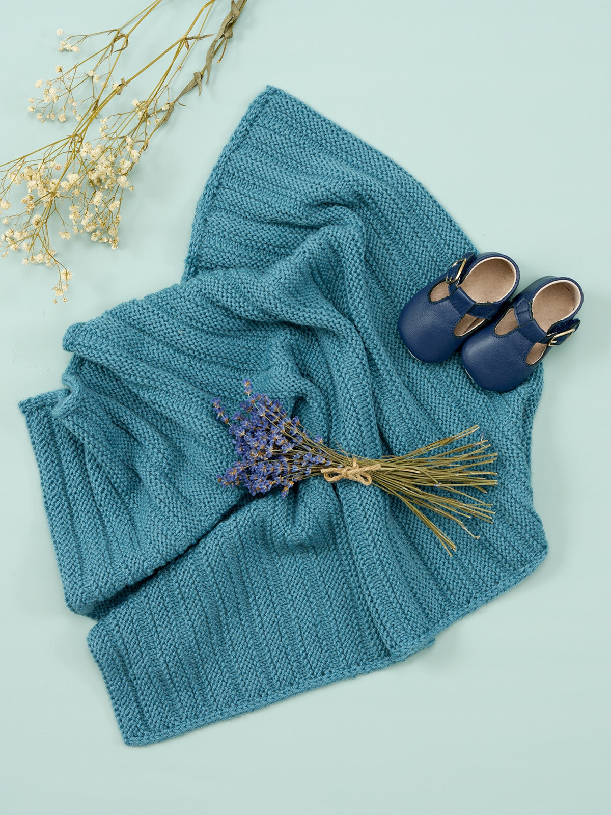 West Yorkshire Spinners Baloo Reversible Blanket Pattern is available to purchase from The Knit Lounge UK knit shop