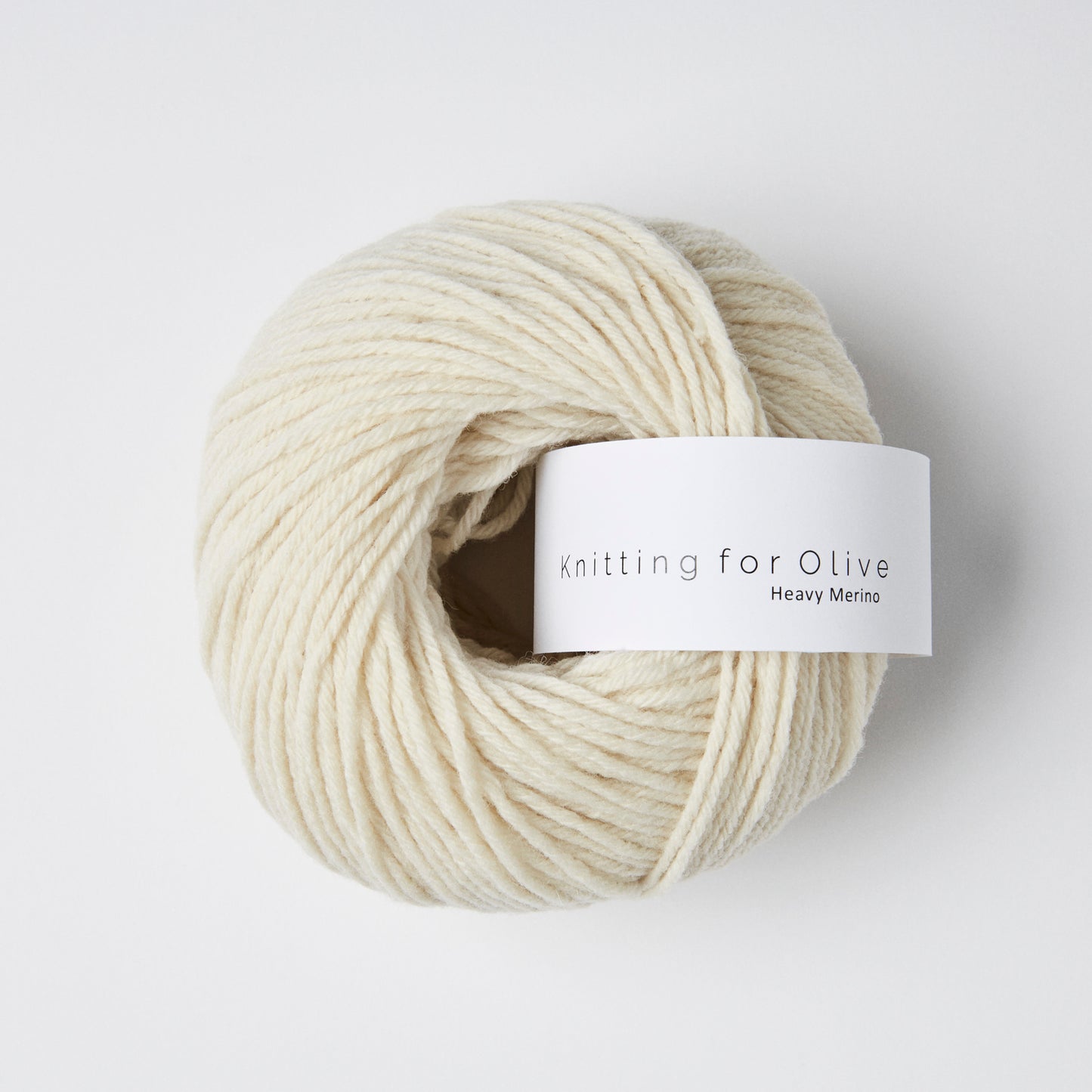 Knitting For Olive Heavy Merino 50g in shade Cream from UK yarn shop The Knit Lounge.