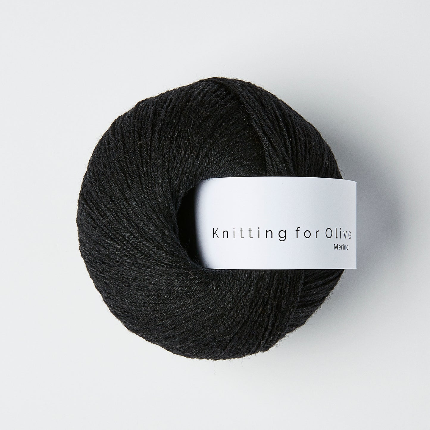 Knitting For Olive Merino 50g in shade Licorice from UK yarn shop The Knit Lounge.
