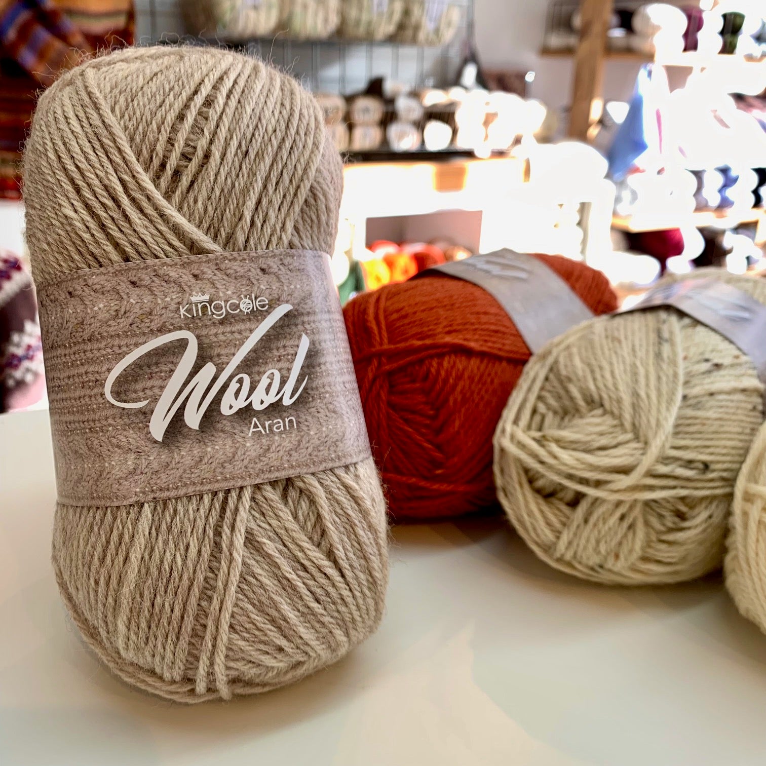 King Cole Wool Aran in 100g balls available at The Knit Lounge UK yarn shop.